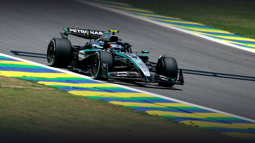 观看诺里斯夺得圣保罗冲刺杆杆位的动作